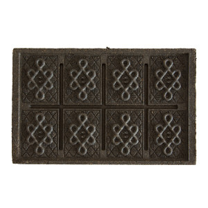 gecomprimeerde Pu Erh thee steen met geometrische patronen en traditionele symbolen