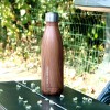 Wooden isothermal bottle