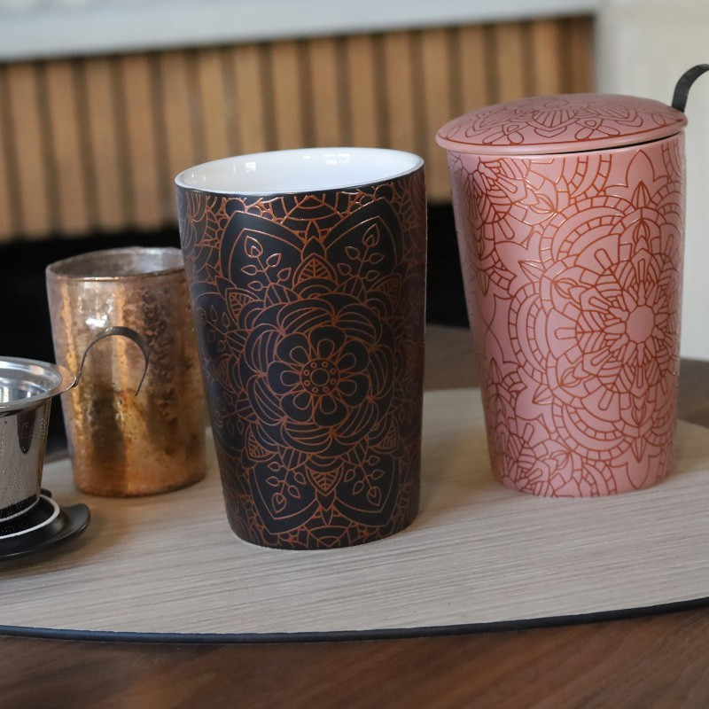Mandala Powder tea infuser mug with infuser, mandala pattern in black and pink on wooden table
