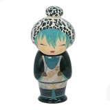 Keramische infuser figuur met luipaardprint muts en jurk met blauwe en zwarte draakdecoratie