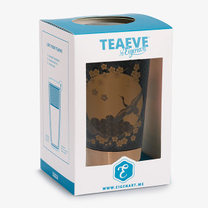 schwarze Teekanne Komorebi mit Vogel- und Blütenmotiv in weiß-blauer Verpackung