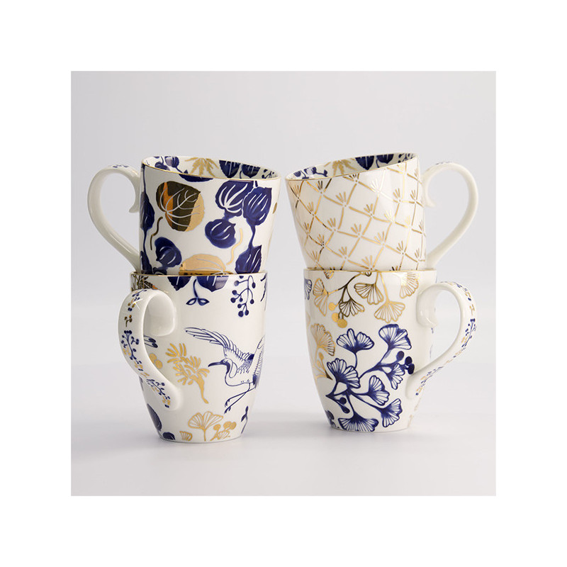 Set of four porcelain mugs with floral and bird motifs navy blue and gold