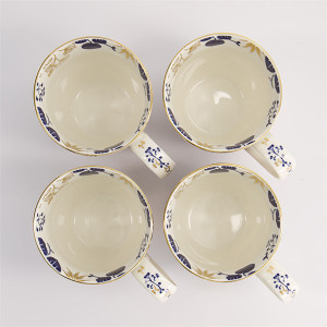four white mugs decorated with blue and golden floral motifs flora japonica gold gift set