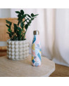 Qwetch Rhapsody thermosfles 500ml met pastelkleurige motieven op stenen tafel