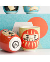 Geschenkset Kawaii-Tasse 170 ml mit rotem und weißem Daruma-Motiv und dekorierter blau-oranger Box
