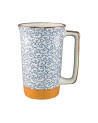 Ceramic mug with blue cloud patterns with orange base and rectangular handle