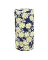 Cylindrical box in washi paper with white flower pattern on navy blue background