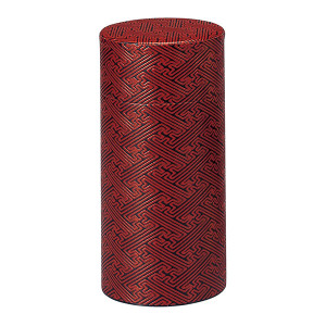 Cilindervormige doos in rood washi-papier met zwart vlechtmotief voor thee en infusies