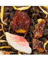 Oolong-Tee mit Feigenstücken, Melone und gelben Blütenblättern