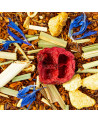 Rooibos-Mischung mit Preiselbeere und Ingwer, garniert mit blauen Blüten und Zitrusfrüchten