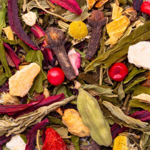 blend of dried herbs CBD anti-stress herbal tea with cloves berries cardamom and yellow flowers