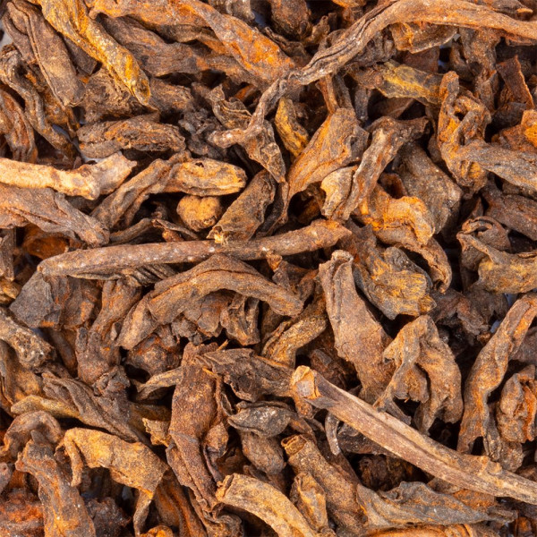 feuilles de thé Pu Erh Menghai 5 ans séchées en vrac couleur brun foncé et orange