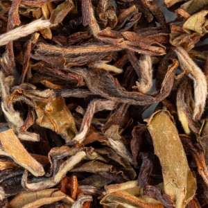 Darjeeling Phuguri 1st Flush organic black tea leaves with brown and white nuances