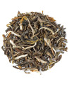 Dry leaves of White Monkey 1st Grade Deluxe green tea with delicate white and green buds