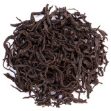 Losse Black Honey 1st Grade zwarte thee bladeren Thés & Traditions op witte achtergrond