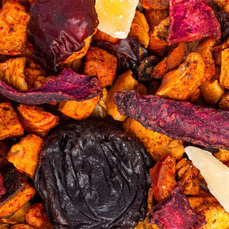 blend of cherry cake herbal tea with dried fruit pieces and red petals