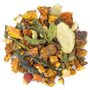 Mischung aus grünen Teeblättern, getrockneten Fruchtstücken und Gewürzen für cremigen Matcha-Kräutertee