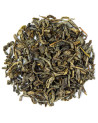 Dried Chun Mee green tea leaves with green and brown nuances