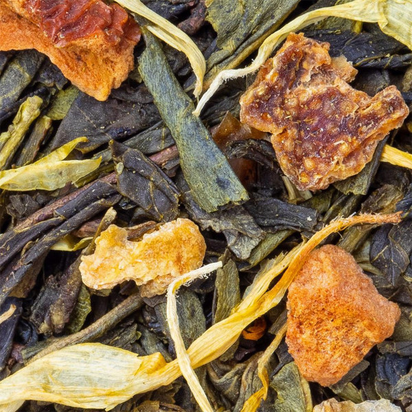green tea leaves blend dried fruit pieces and yellow petals from céline cookie green tea