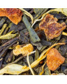green tea leaves blend dried fruit pieces and yellow petals from céline cookie green tea