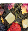 green tea blend with dried fruit pieces flower petals and tea leaves