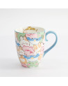 Keramische mok met gekleurde kawaii dierenmotieven en blauw handvat