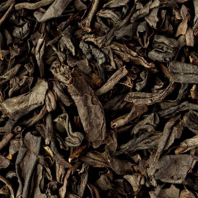 Feuilles sèches de thé noir Keemun aux nuances brunes et noires pour infusion raffinée