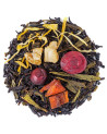 Mischung aus schwarzem Tee mit getrockneten Fruchtstücken und gelben Blütenblättern für aromatische Aufgüsse