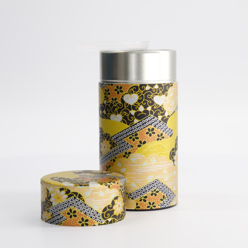 Metal box decorated with traditional Japanese pattern yellow black and gold for tea