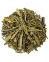 Dry leaves of Japanese Bancha green tea with long flat green leaves