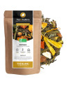 Organic exotic white tea in kraft bag with dried fruit and flower pieces