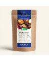 Nachfüllbarer Kraftpapierbeutel mit Weihnachts-Rooibos, dunkelblauem und goldenem Etikett von Thés & Traditions, Fenster zum Seh