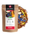 Rooibos Blue Downs smaak mango sinaasappel in kraft zakje met blauwe bloemen en stukjes biologisch fruit