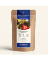 Wiederverschließbarer Kraftpapier-Beutel mit Rooibos Lagoon Beach, dunkelblau-goldenes Etikett von Thés & Traditions, Fenster ze
