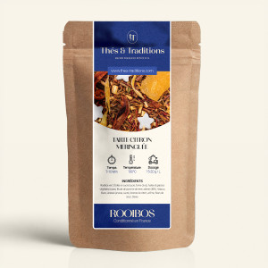 Wiederverschließbarer Kraftpapierbeutel mit Rooibos Zitrone Baiser, dunkelblauem und goldenem Etikett von Thés & Traditions, Fen