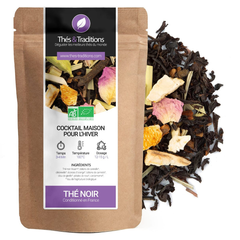 Winter house cocktail black tea with orange peel pieces cinnamon and organic rose petals