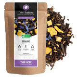 Organic licorice black tea in kraft bag with licorice pieces and blue flowers