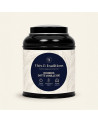 Runde schwarze Teedose mit Rooibos Dattel Vanille von Thés & Traditions, cremefarbenes Etikett mit Blattmuster und dunkelblauem 