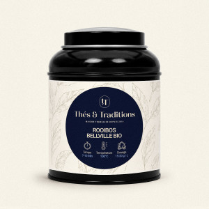 Runde schwarze Teedose mit Rooibos Bellville von Thés & Traditions, cremefarbenes Etikett mit Blattmotiven und dunkelblau-golden