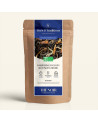 Wiederverschließbarer Kraftpapierbeutel mit Schwarztee Darjeeling FTGFOP1 2nd Flush, Etikett in Dunkelblau und Gold von Thés & T