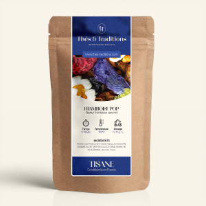 Wiederverschließbarer Kraftpapierbeutel der Kräutertee Himbeere Pop mit dunkelblauem und goldenem Etikett von Thés & Traditions,