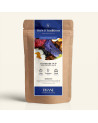 Wiederverschließbarer Kraftpapierbeutel der Kräutertee Himbeere Pop mit dunkelblauem und goldenem Etikett von Thés & Traditions,