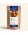 Wiederverschließbarer Kraftpapierbeutel der Kräutertee-Mischung Mango Lover, Etikett in Marineblau und Gold von Thés & Tradition