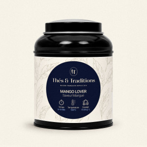 Schwarze runde Teedose der Kräutertee Mango Lover von Thés & Traditions, cremefarbenes Etikett mit Blattmuster und marineblauem 