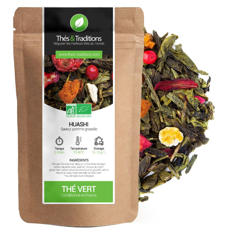 Groene thee Huashi smaak appel rode bes kraft zakje bio ingrediënten zichtbare bladeren en gedroogd fruit