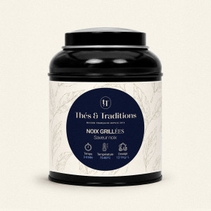 Runde schwarze Teedose mit Grüntee Geröstete Nüsse von Thés & Traditions, cremefarbenes Etikett mit Blattmuster und dunkelblauem