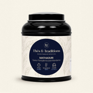 Schwarze runde Teedose mit Thé Noir Mathaouri von Thés & Traditions, cremefarbenes Etikett mit Blattmuster und dunkelblauem Meda