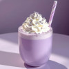 Purple drink with ube powder topped with whipped cream and purple and white striped straw