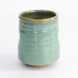 Green ceramic cup with brown rim glossy finish rounded shape
