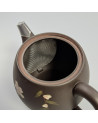 Tokoname black teapot with white flower pattern and integrated stainless steel filter